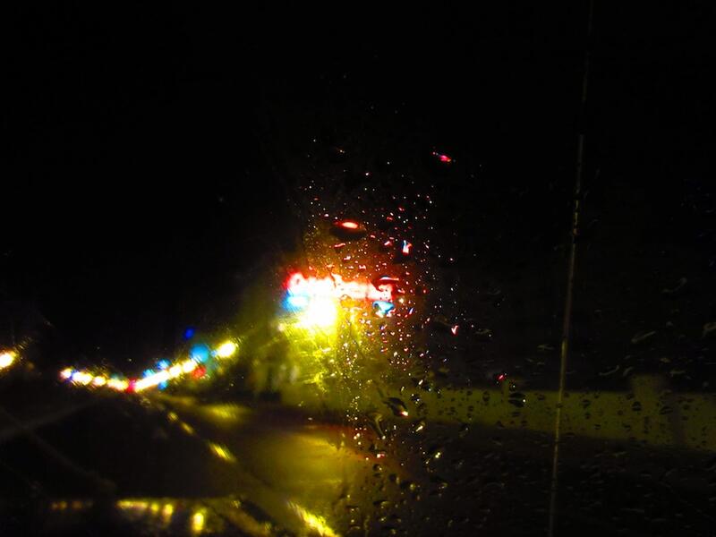 motel neon obscured in rain