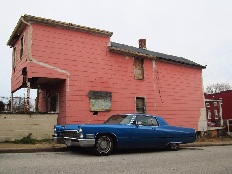 blue caddy, pink house