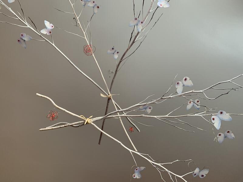 Wrapped branches with butterflies. 