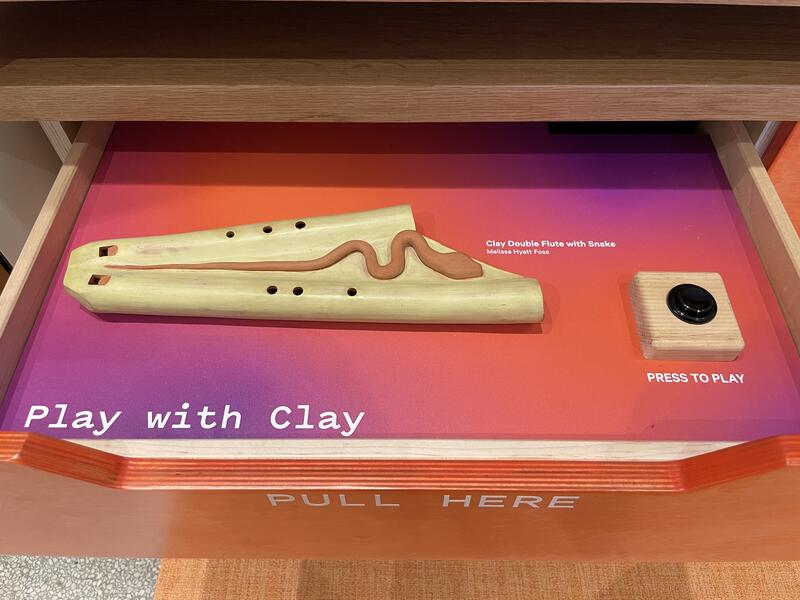 Double flute installed in a discovery drawer of the Wall of Wonder