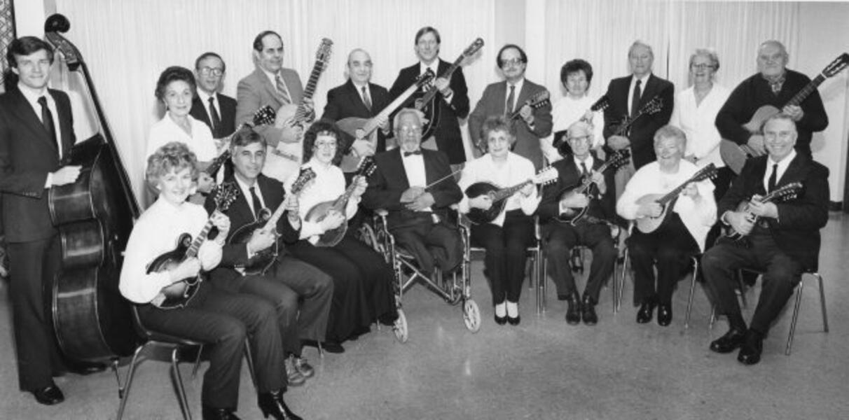 The Baltimore Mandolin Orchestra, ca. 1986, with director Benjamin Durant (center, front row)
