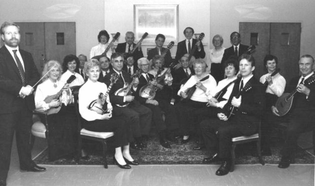 The Baltimore Mandolin Orchestra, 1988, with director David T. Evans (standing at left)