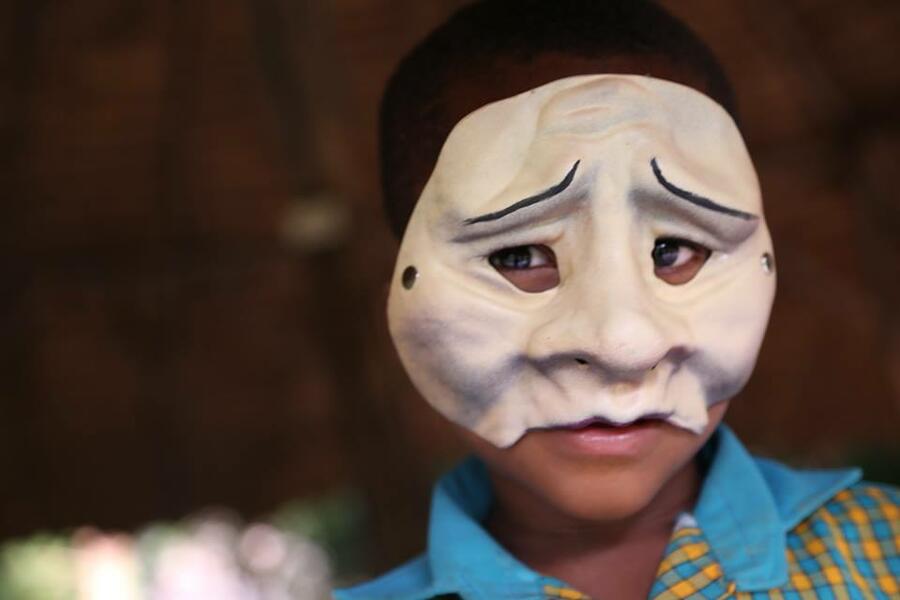 Shame Mask on young boy in Ghana