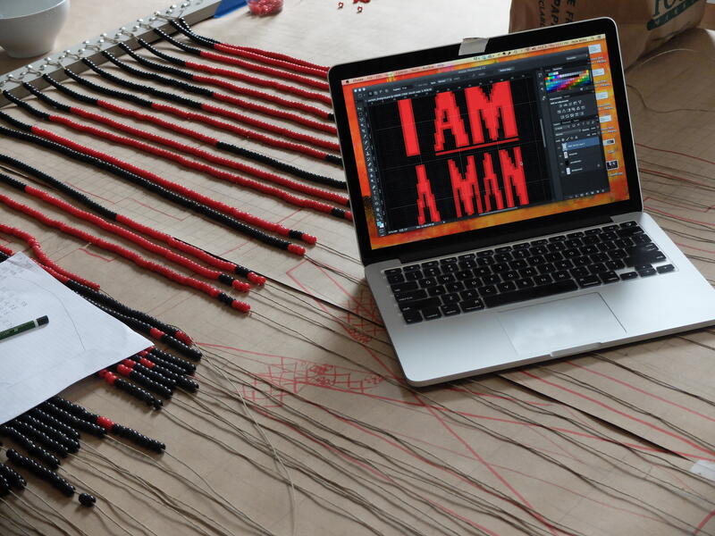 Artists Installing- I AM A MAN